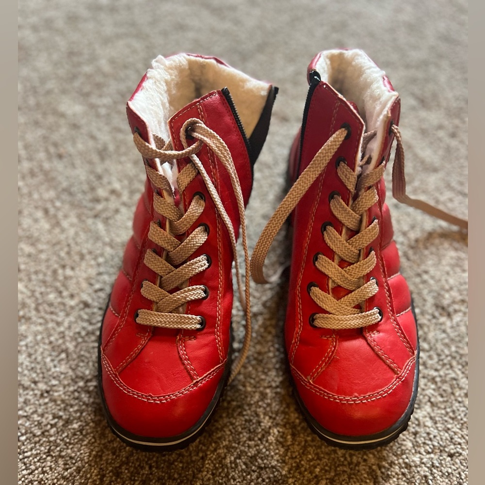 Bright red Rieker boots! Only worn once and in excellent condition size 41.